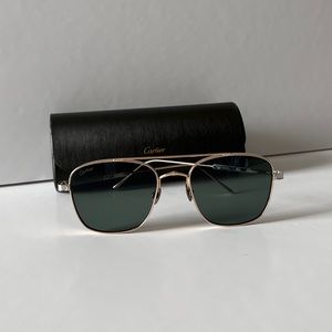 Worn twice, bought in Aruba. Signature C de Cartier sunglasses with green lens